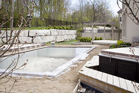 An Empty Pool being installed