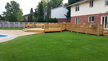 Outdoor bathroom with toilet sink and dresser all white and black