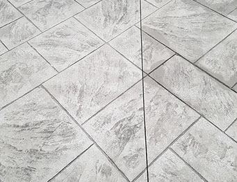Outdoor bathroom with toilet sink and dresser all white and black