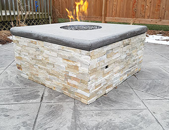 Outdoor bathroom with toilet sink and dresser all white and black
