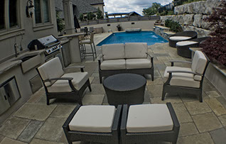 Blue Crystal Clear Swimming Pool with Rock Waterfall, Beautiful Backyard
