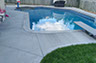 Blue Crystal Clear Swimming Pool with Rock Waterfall, Beautiful Backyard built by Flandscape in London Ontario