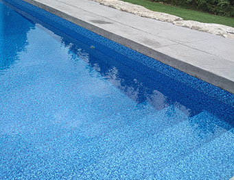 Outdoor bathroom with toilet sink and dresser all white and black