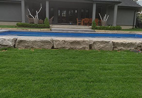 Outdoor bathroom with toilet sink and dresser all white and black